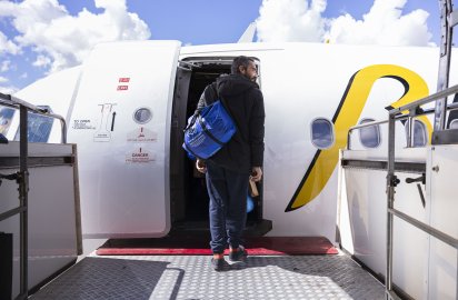 IOM Celebrates 100,000 Migrants' Safe Return from Libya
