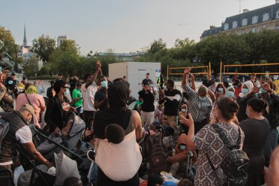 Migrant Families with Children Seek Shelter Outside Paris City Hall
